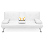 White leather sofa with a small table and items on a white background