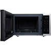 Black microwave oven with open door on a white background