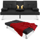 Black leather sofa bed with a red blanket and two drinks on a white background