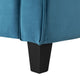 Close-up of a blue upholstered chair with a black leg on a white background
