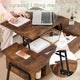 Wooden desk with laptop and person working, highlighting upgraded lifting mechanism.