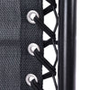 Close-up of black laces being tied on a black shoe with white eyelets.