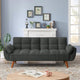 Gray sofa in a living room with a fireplace and decorative items.
