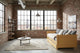 Wooden sofa bed in a studio loft apartment