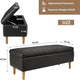 Black storage bench with dimensions and weight capacity displayed