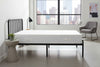 White mattress inside the bedroom of an apartment