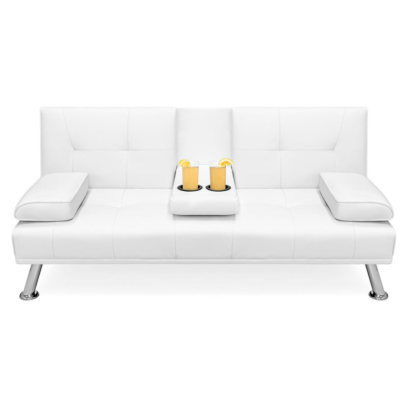 White leather sofa with a small table and items on a white background
